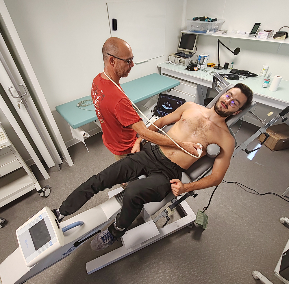 Stéphane Nottin performs a cardiac ultrasound on an athlete during exercise